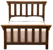 Front view of the Pikes Peak Reclaimed Barnwood Post Bed with mission-style slats and white bedding