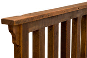 Close-up of the Pikes Peak Reclaimed Barnwood Post Bed top rail, corbel, and reclaimed oak slats