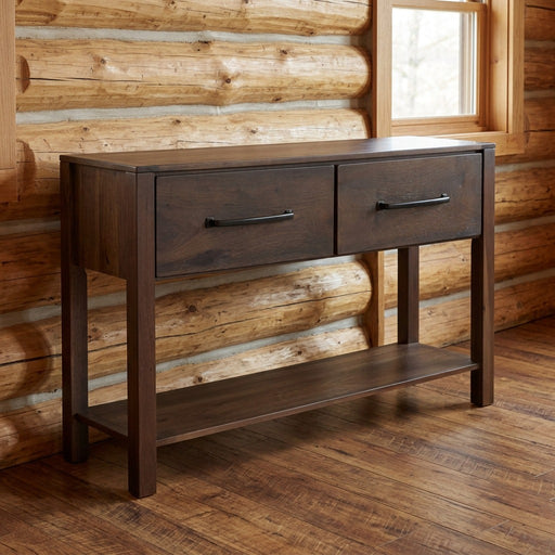 Quail Mountain Solid Hickory Two Drawer Console Table staged in a sunlit log cabin living room
