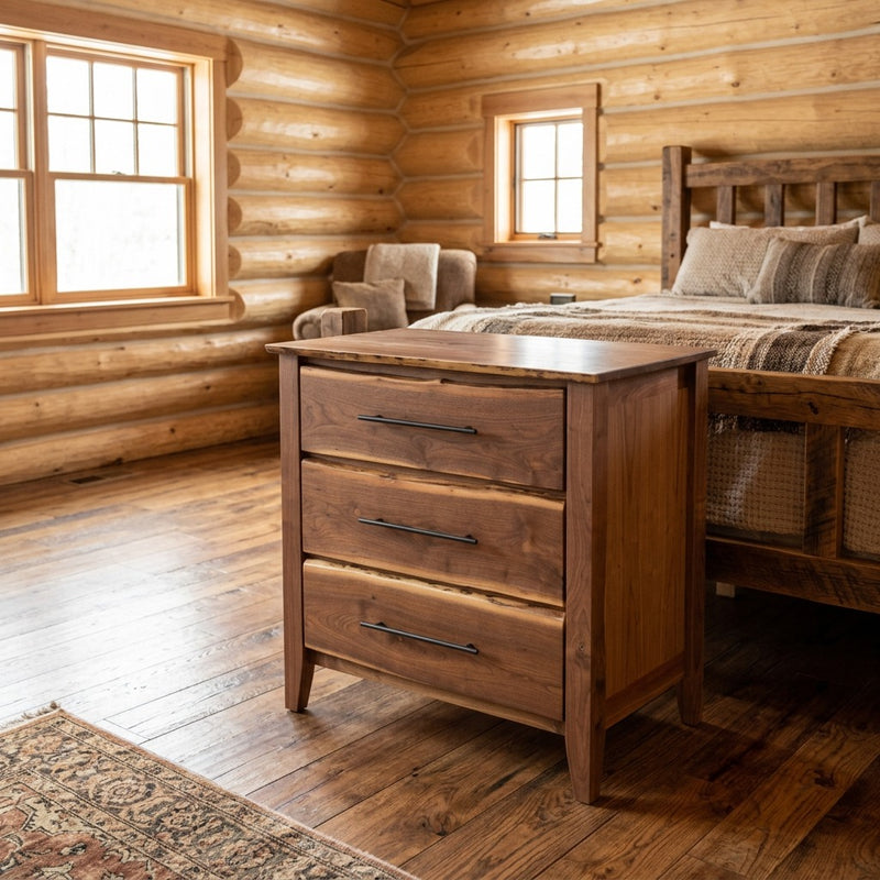 Ragged Mountain Live Edge Walnut Three Drawer Chest staged in a sunlit log cabin bedroom