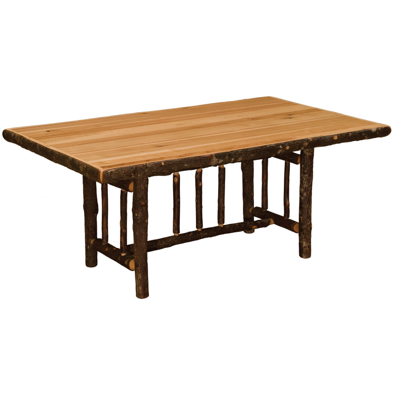 Angled view of the Raleigh Peak Hickory Log Rectangle Dining Table in Natural showing bark-on trim