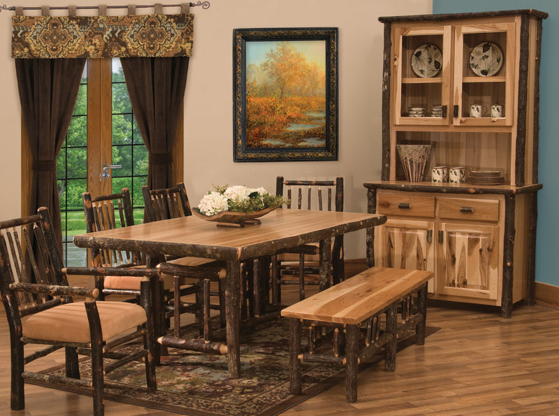 Raleigh Peak Hickory Log Rectangle Dining Table with chairs in a cabin dining room