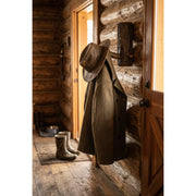 Reno Mountain Hickory Log Curtain Bracket and Coat Peg holding a coat and hat in a log cabin entryway