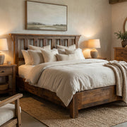 Rito Alto Peak Reclaimed Barnwood Post Bed with Rail System with layered bedding in a cozy bedroom