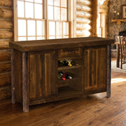 Rosedale Peak Barnwood and Hickory Wine Rack Sideboard staged in a sunlit log cabin dining room