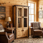 Ruby Mountain Hickory Log Eight Gun Cabinet in Natural in a bright cabin room