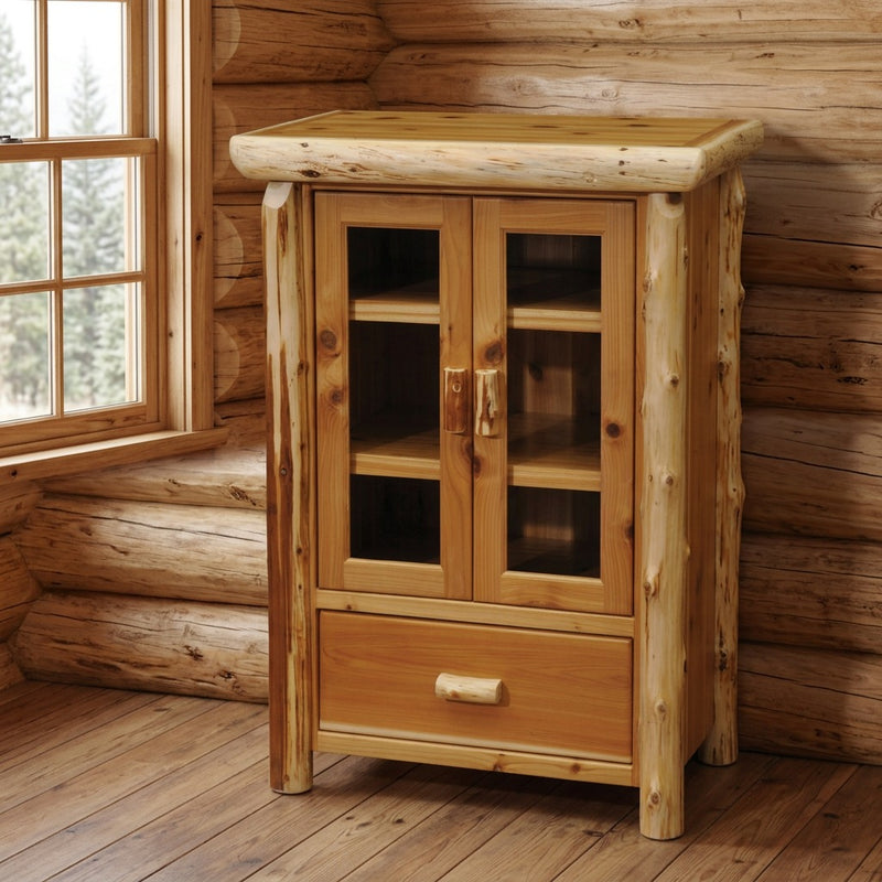 Ruby Peak Cedar Log Media Cabinet staged in a sunlit log cabin living room