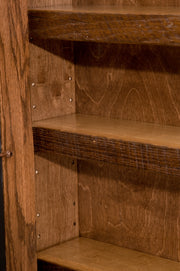 Close-up of the reclaimed oak on the Sand Mountain Reclaimed Barnwood Five Shelf Bookcase