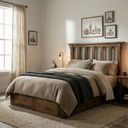 Snowmass Mountain Barnwood Post Platform Bed with a dark green throw and framed prints above in a softly lit modern farmhouse bedroom