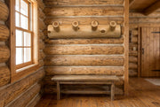 St Vrain Mountain Cedar Log Wall Coat Rack staged in a sunlit log cabin entryway