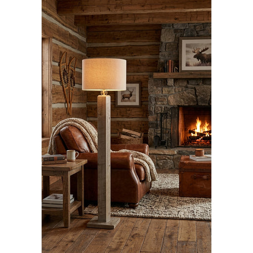 Stanley Mountain Pine Floor Lamp staged in a rustic log cabin living room, shown with a lamp shade (shade not included)