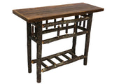 Angled view of the Stones Peak Barnwood and Hickory Open Sofa Table showing the barnwood top and hickory twig base