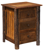 Angled view of the Tabeguache Peak Barnwood and Hickory Three Drawer Nightstand showing three drawers framed by hickory log posts