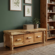 Thunder Butte Cedar Log Entry Bench with Drawers in a rustic cabin entryway