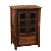 Angled view of the Thunder Mountain Reclaimed Barnwood Media Cabinet showing glass-paned doors and lower drawer