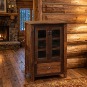 Thunder Mountain Reclaimed Barnwood Media Cabinet in a log cabin living room