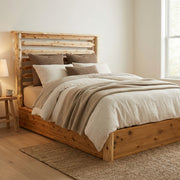 Thunder Pyramid Cedar Log Horizontal Rail Platform Bed with layered bedding in a bright bedroom