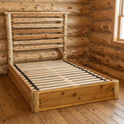 Thunder Pyramid Cedar Log Horizontal Rail Platform Bed staged in a sunlit log cabin bedroom