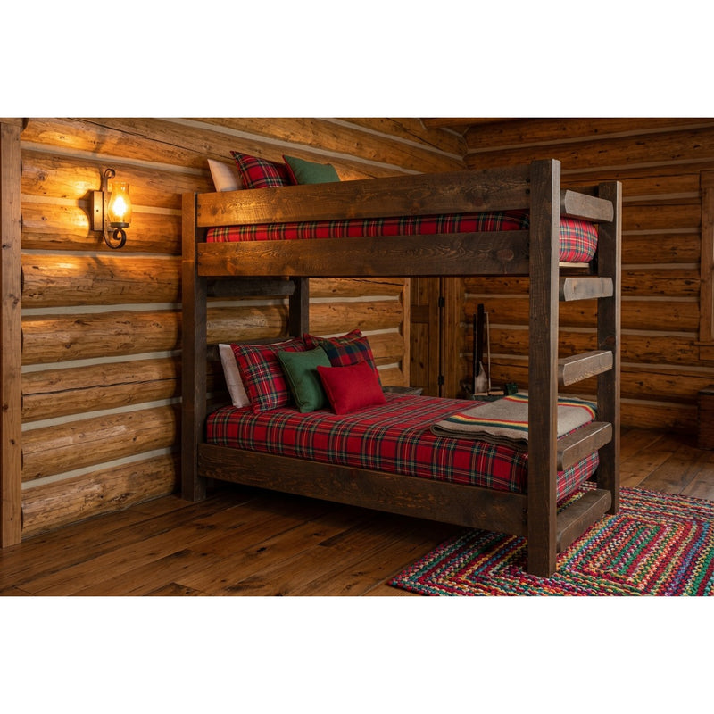 Twin Sisters Peak Pine Bunk Bed staged in a rustic log cabin bunk room