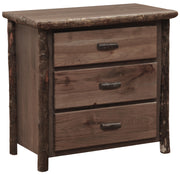 Angled view of the Twining Peak Hickory Log Chest of Drawers in Slate showing three drawers and bark-on log posts