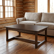 Williams Mountain Solid Hickory Open Coffee Table staged in a sunlit log cabin living room