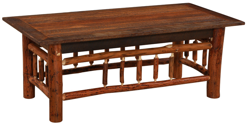 Angled view of the Woods Mountain Barnwood and Hickory Rectangle Coffee Table showing the planked top and hickory legs